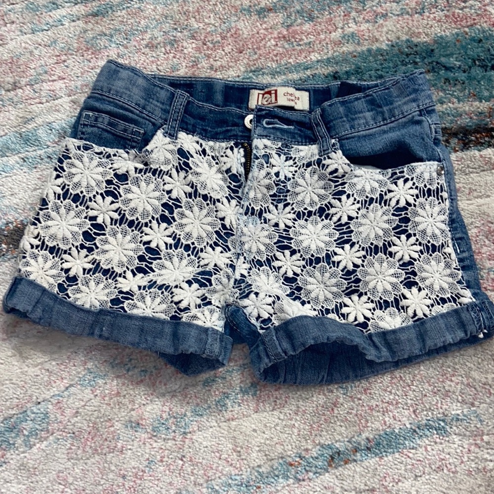 Flower lace blue jean shorts.